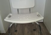 Shower chair height adjustable.