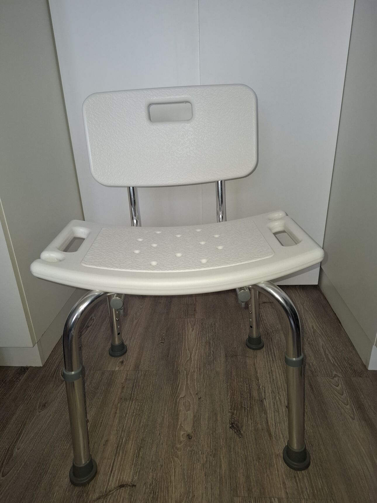 Shower chair height adjustable.