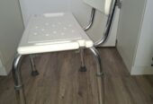 Shower chair height adjustable.
