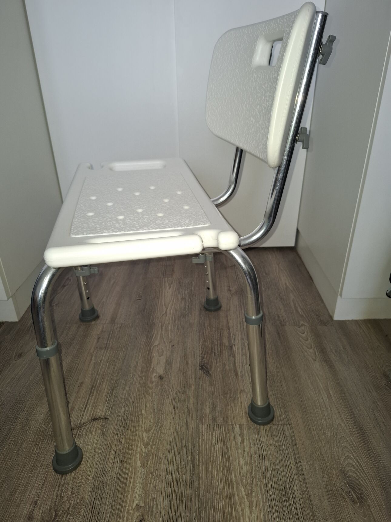 Shower chair height adjustable.