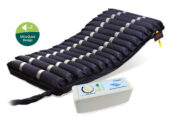 Mobility bed pressure mattress and wheelchair