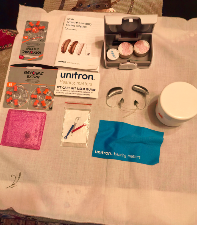 Unitron Stride Behind-The-Ear (BTE) Hearing Aids with Charging Case