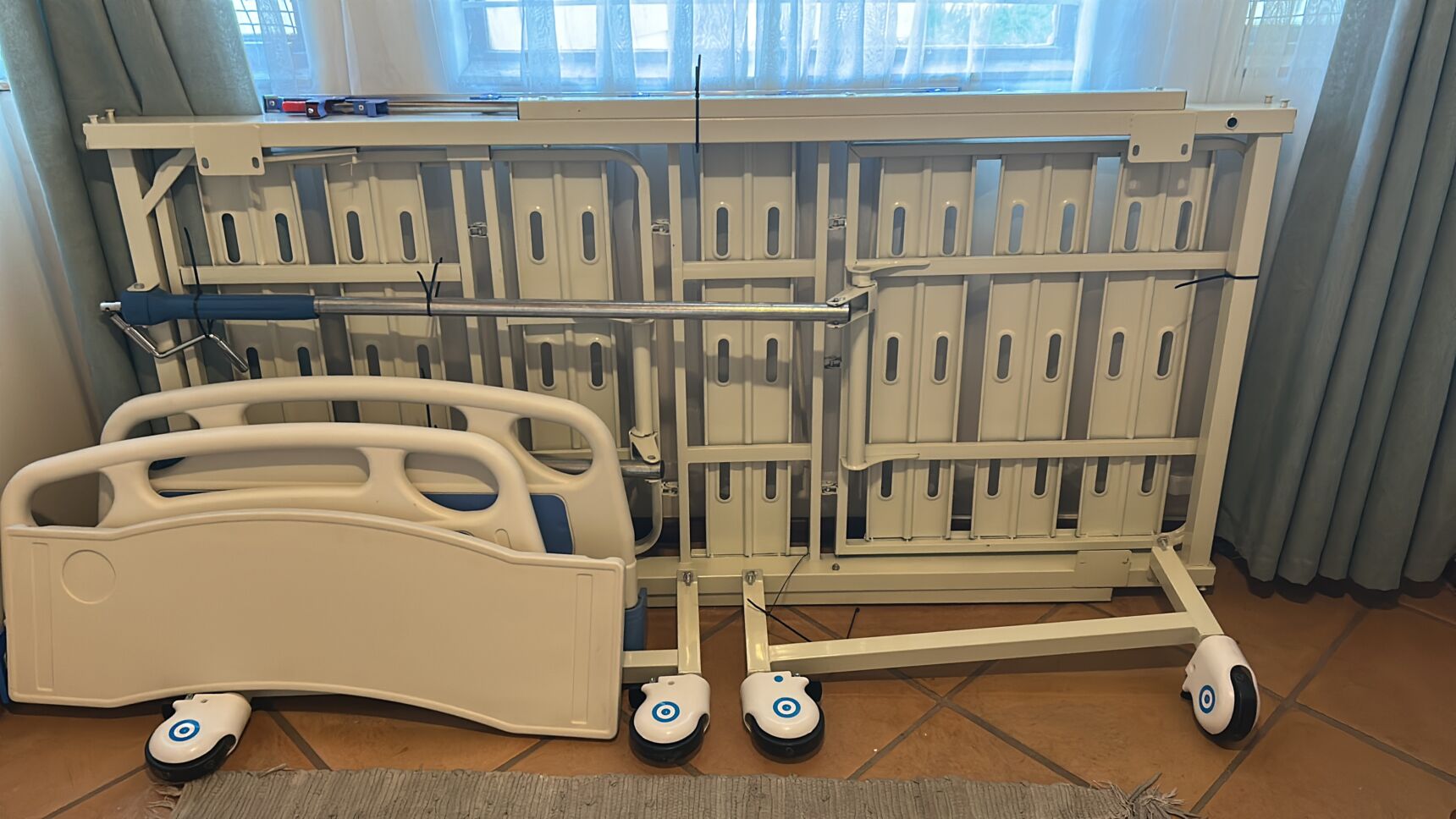 Two crank hospital bed in good condition for sale.