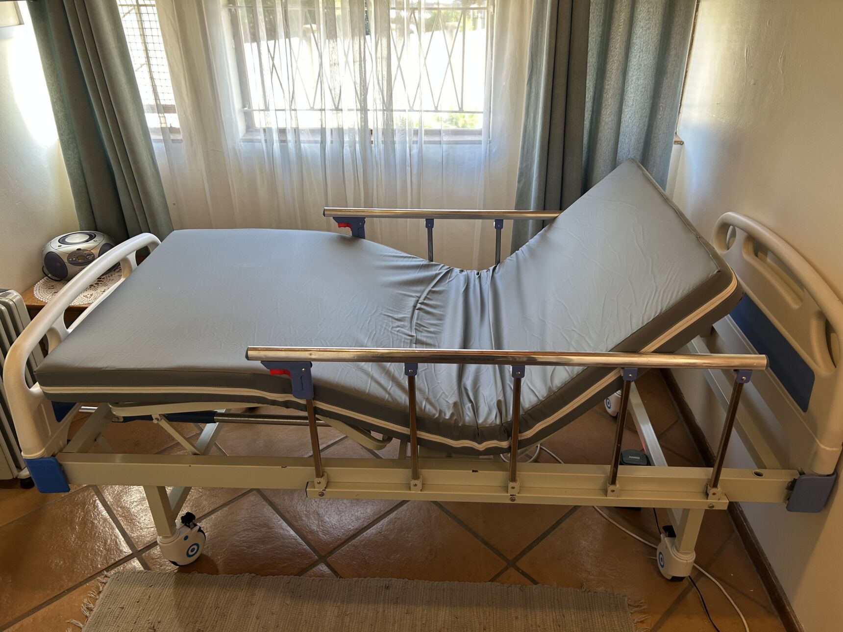 Two crank hospital bed with waterproof mattress