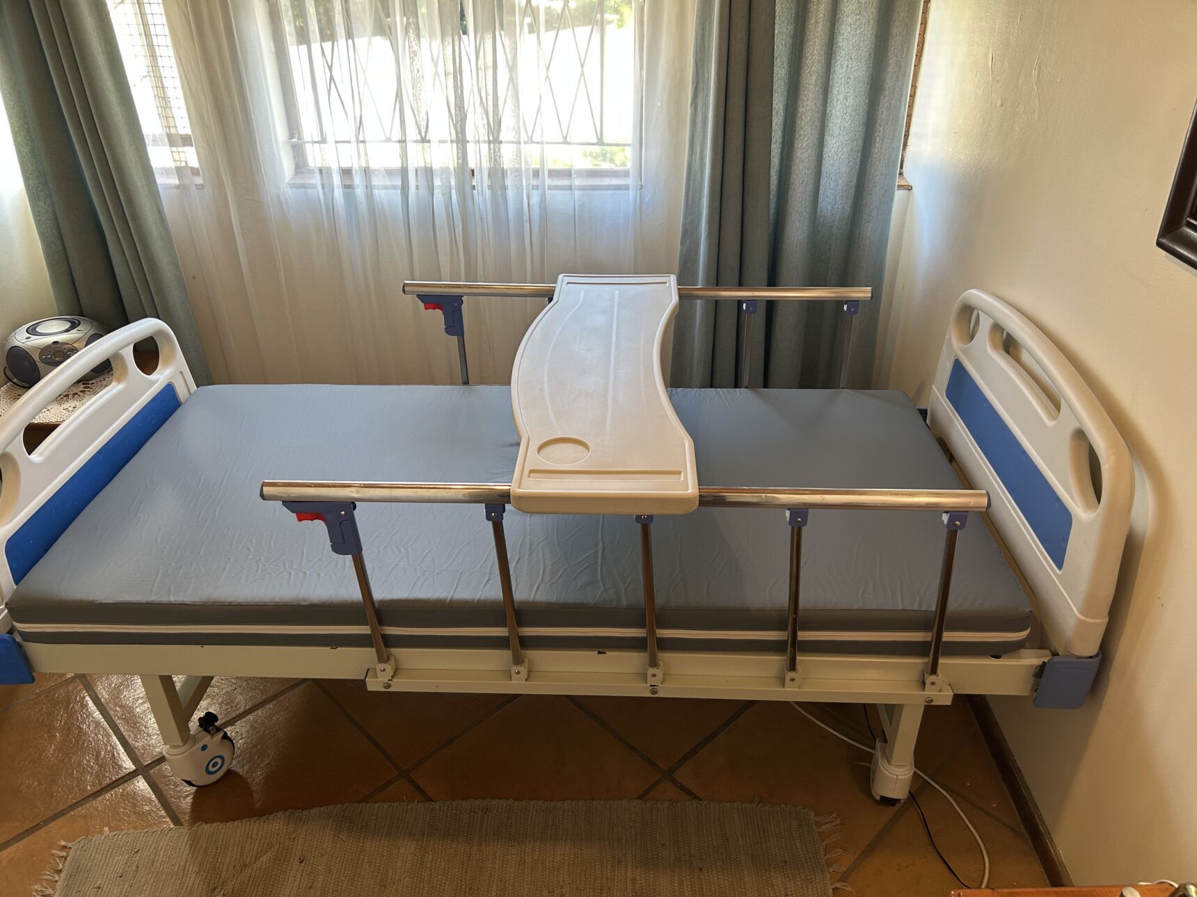 Two crank hospital bed in good condition for sale.
